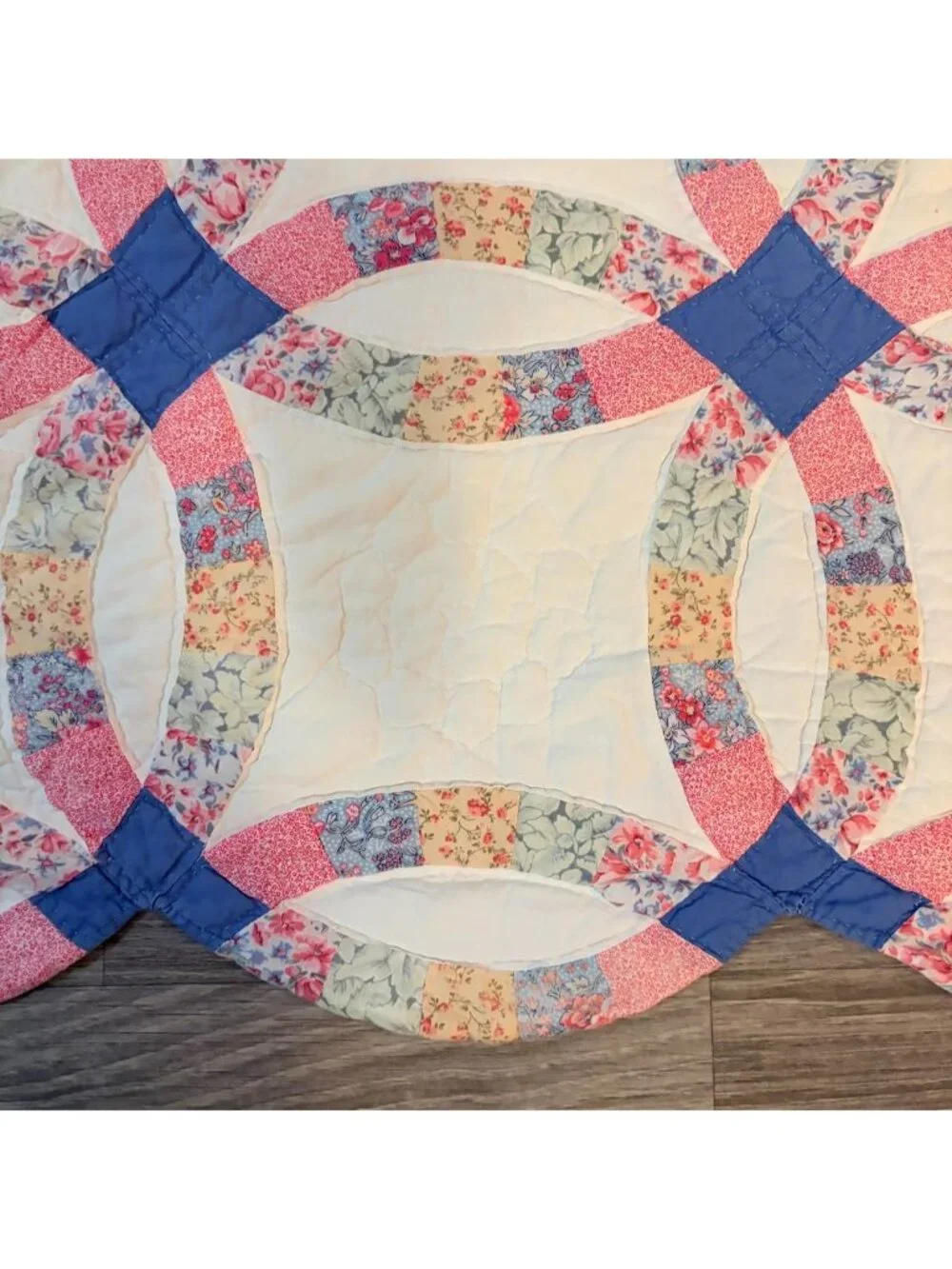 Vintage handmade pastel floral pink and blue wedding ring quilt blanket